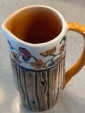 Carved Pitcher